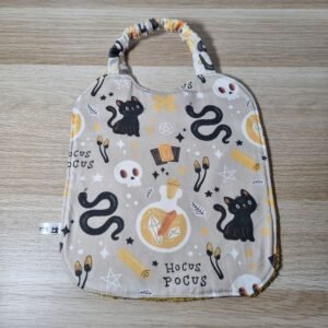 Bavoir élastique Sorcellerie jaune