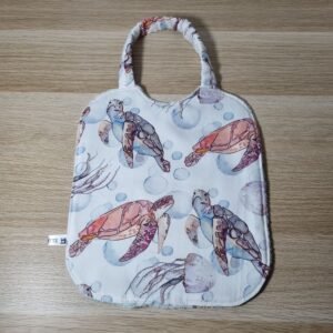 Bavoir élastique Tortues bleu ciel